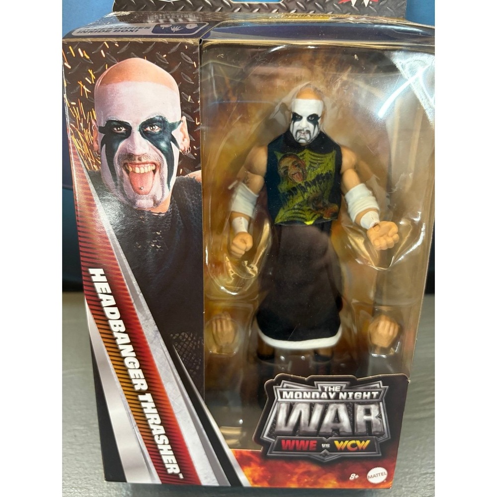 WWE Elite - Headbanger Thrasher MNW (Rick Rude)